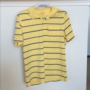 Yellow collared shirt with navy stripes.